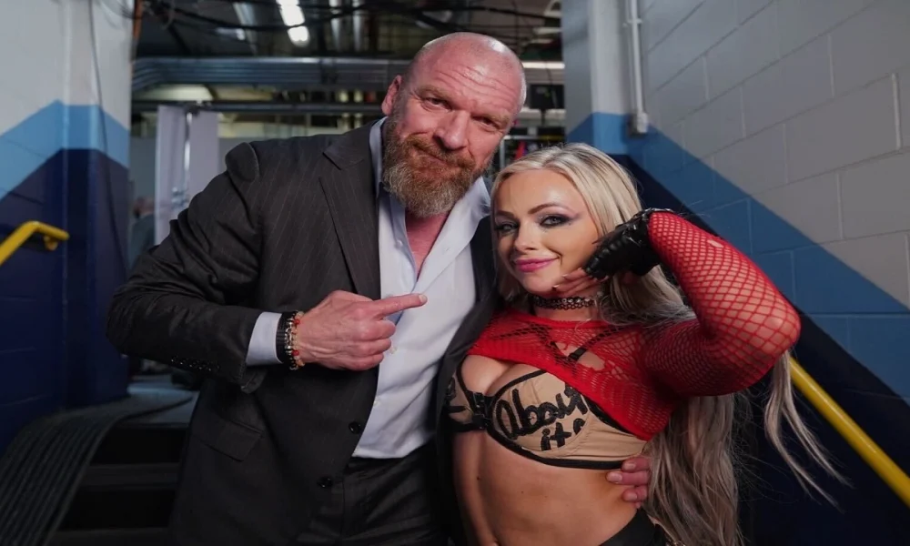 Liv Morgan - Triple H